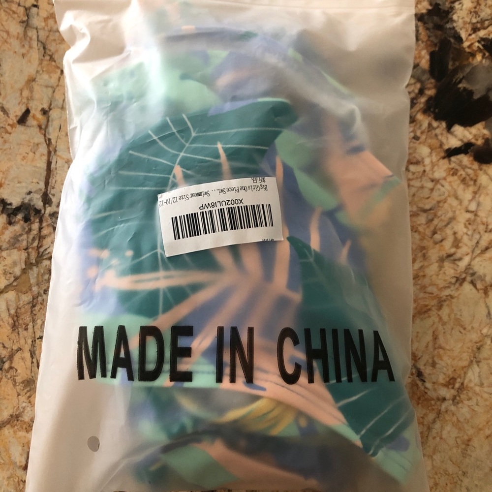 New from Amazon never worn girls swimsuit 10/12